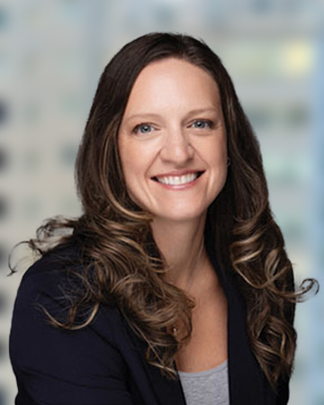 a woman with long hair smiling